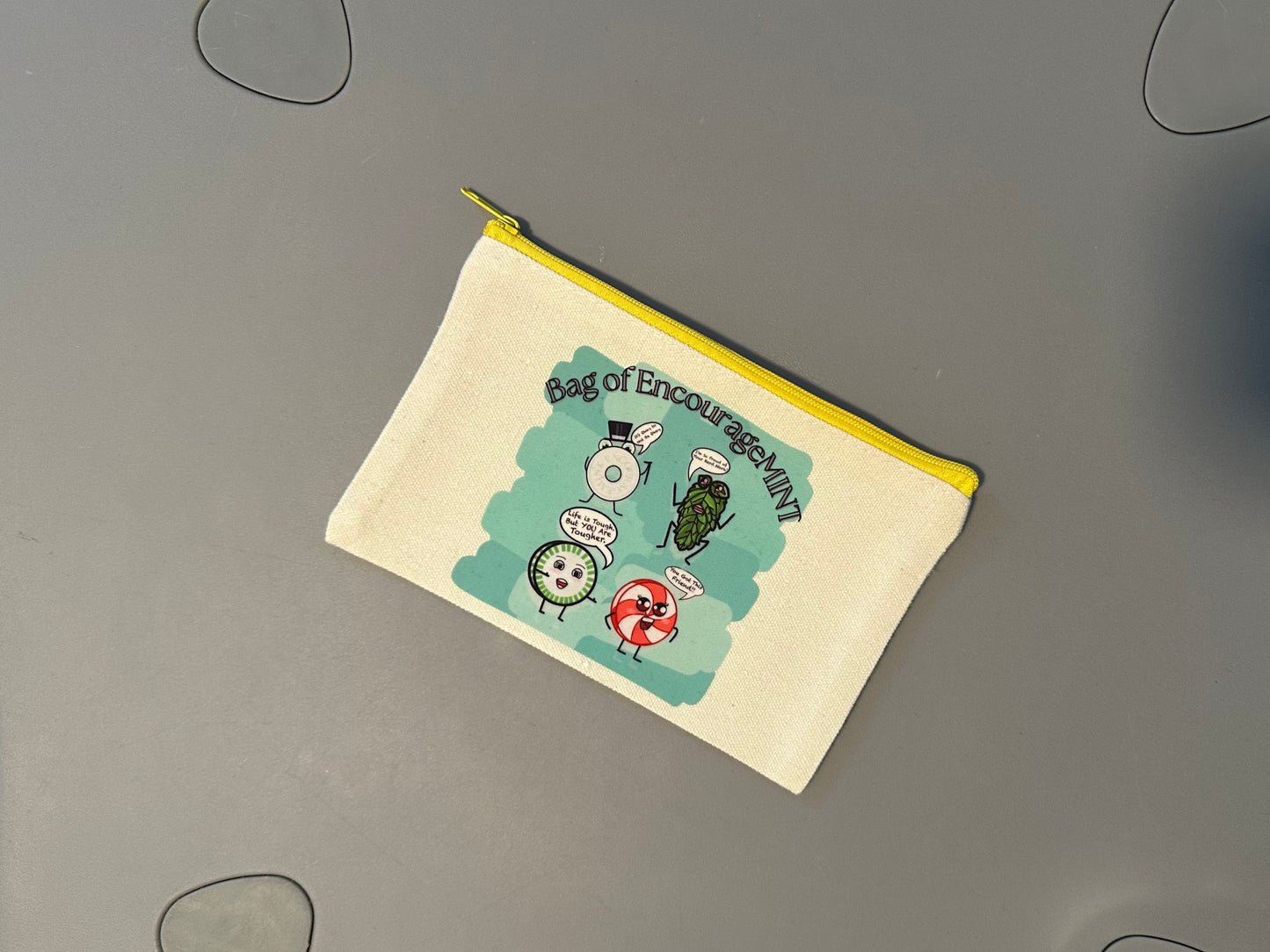 “Bag of EncourageMINT” Zipper Pouch – Blue Background, White Zipper - No Handle